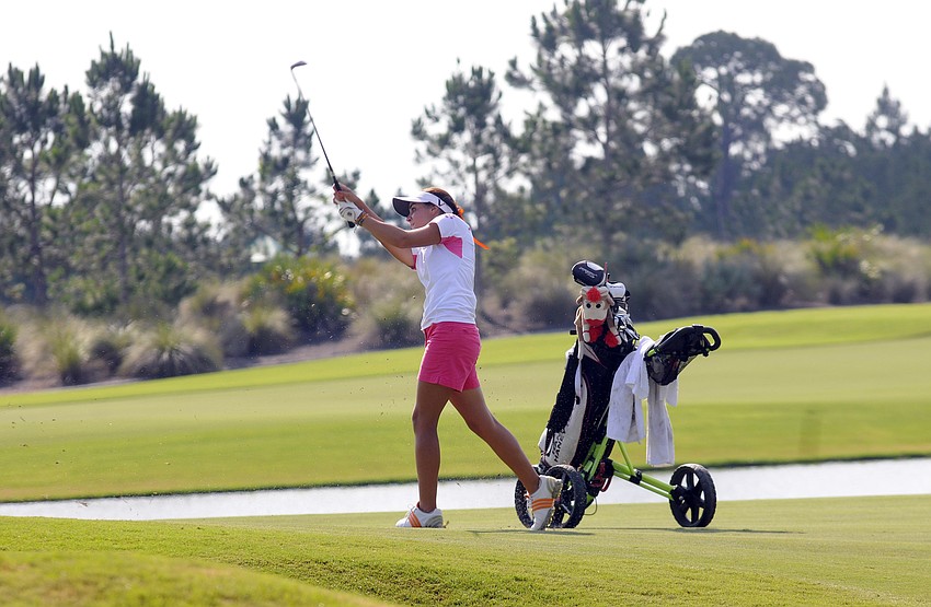 Clementina Rodriguez fires off her second shot on the No. 10 hole.