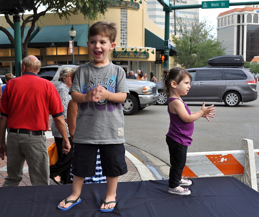 Jake and Brooke Feldman dance to the live music.