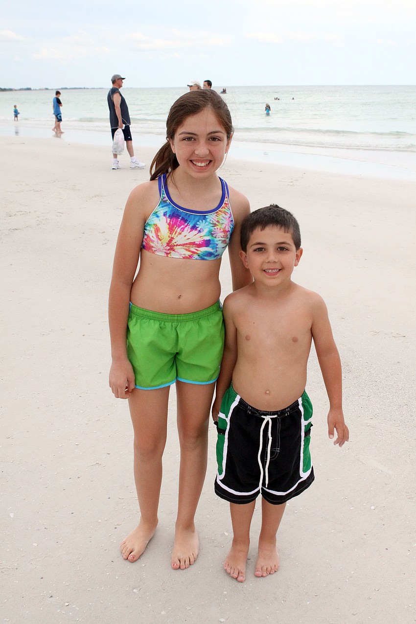 Camryn Cohen, 12, with her brother, Spencer, 6