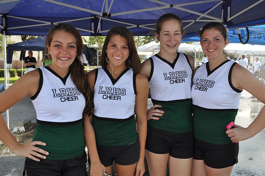 Lakewood Ranch High School cheerleaders Lily Dominguez, Sierra Schuetz, Ashlyn Martin and Bailee French helped out with a vehicle crash simulation scene.