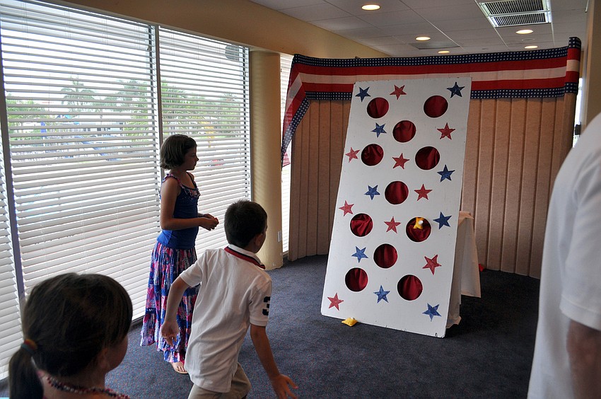 Children played a variety of games at the event, including the bean bag toss.