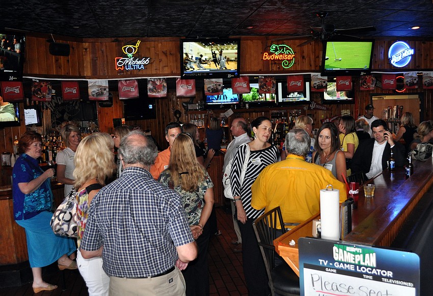 A large crowd came out to the Sarasota Chamber of Commerce's First Monday, Monday, July 9, at Findaddy's.