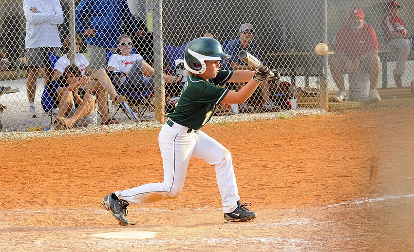 Lakewood Ranch Little League 9-10 All-Star Schaffer Clatt lays down a perfect bunt.