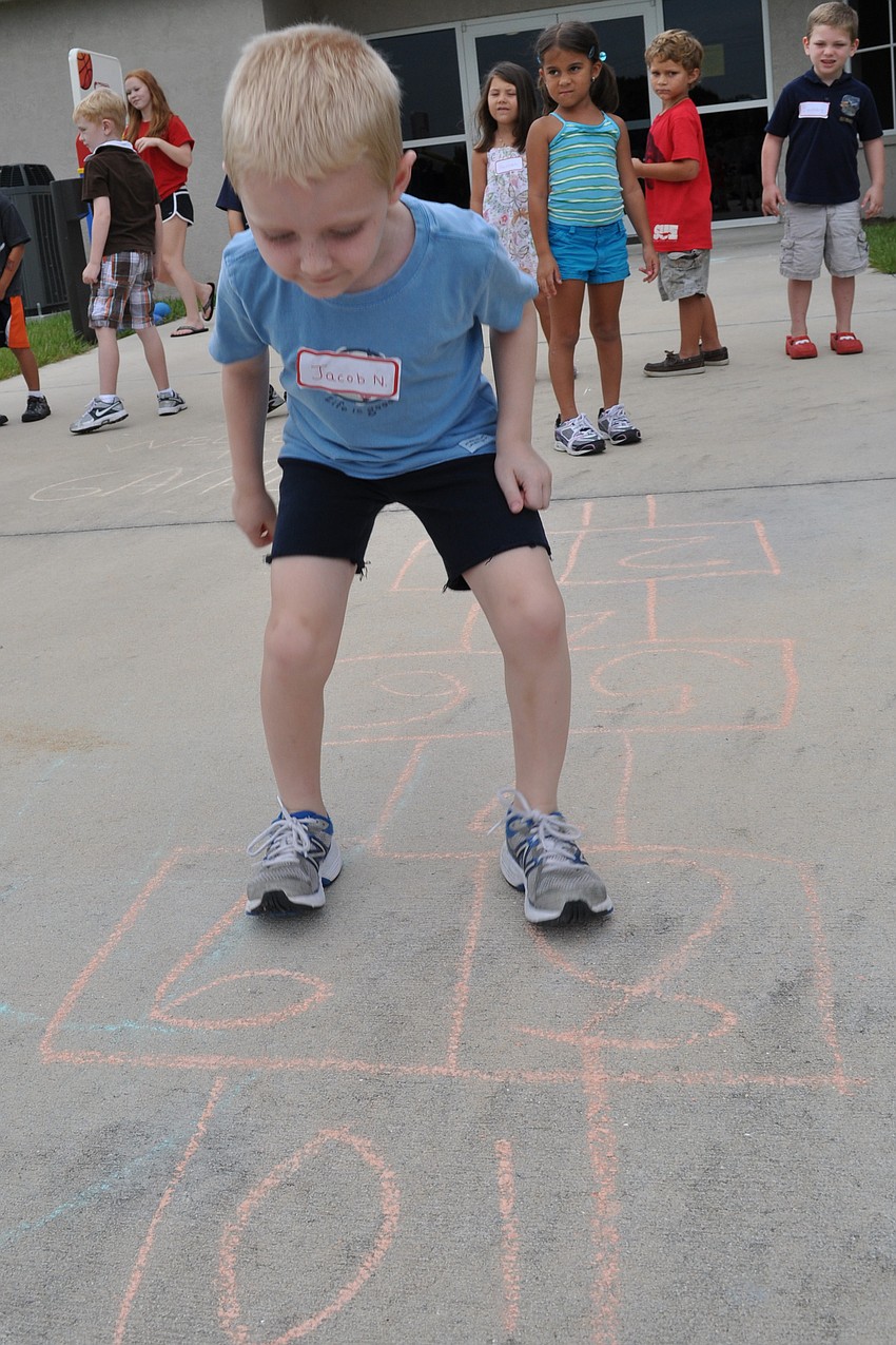 Jacob Niesen, 6, made his way through a game of hopscotch.
