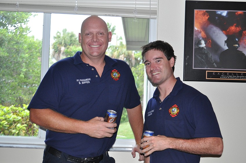 Firefighter Paramedic Bryan Bippen and Firefighter Paramedic Brian Kolesa