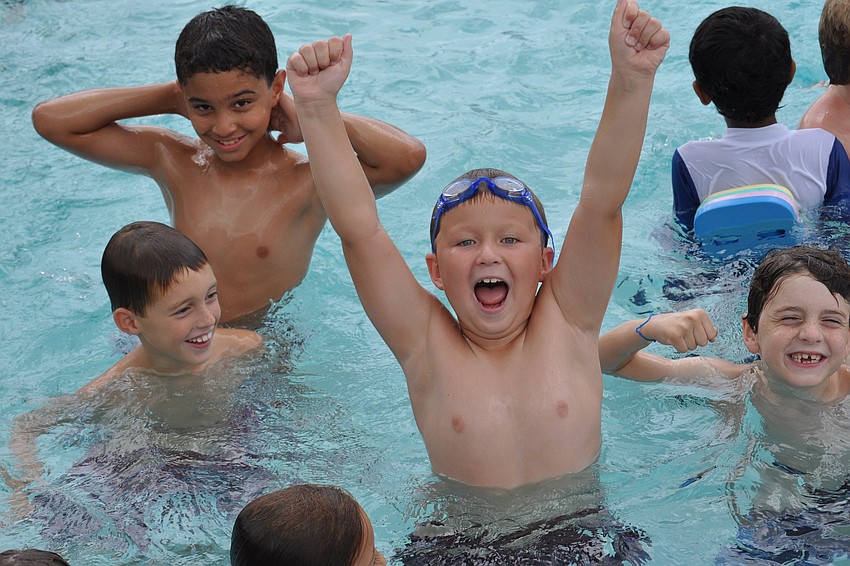 Jack Mowrey, center, is 7 years old.