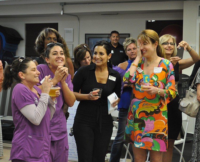Angie Emanuelli, Danielle Barrio, Marisol Rodriguez and Dr. Liz Callahan hope to win a raffle prize.
