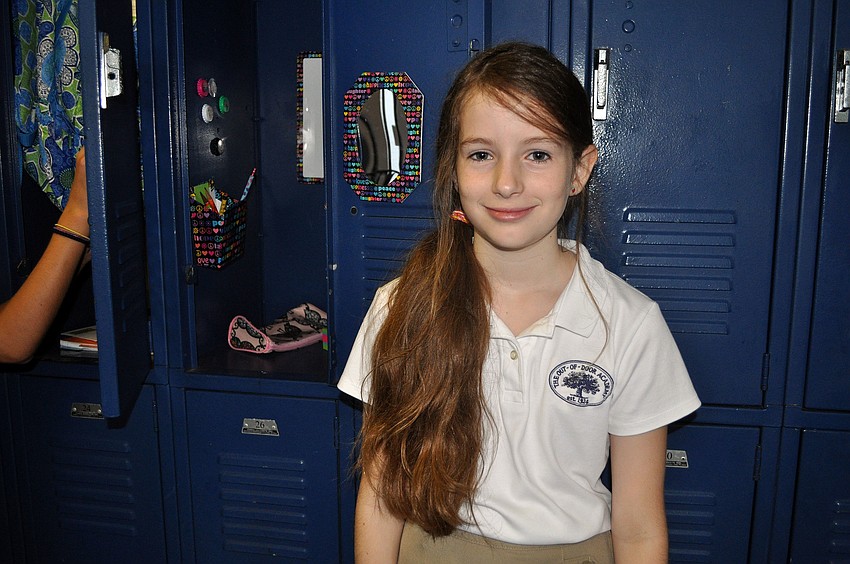 Sophia Mascorro, 10, shows off her decorated locker.