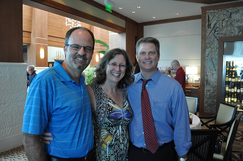 Michael and Grace Carlson and Paul Hudson