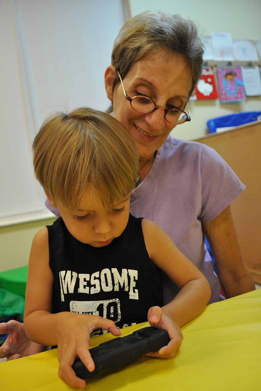 Max Morales played the game Angry Birds on his grandmother, Candy Fischer's, iphone.