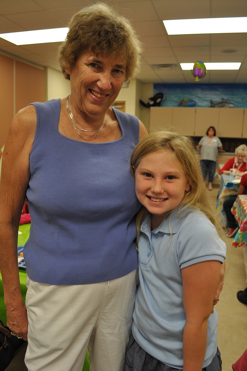 Susan Murphy got a big hug from her granddaughter, Katie Murphy, a fourth-grade student at Braden River.