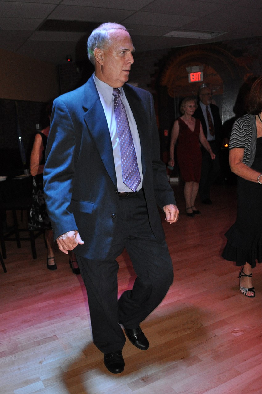 Jerry Rogers tried tested his skills dancing the salsa.