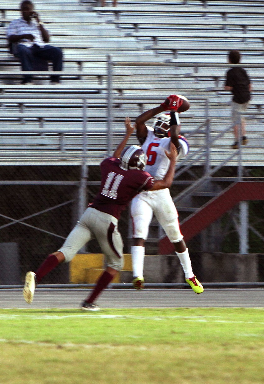 Brandon Gomes, No. 11, tackles Matthew Evans, No. 6, during the Riverview v. Manatee game Friday, Sept. 7 at the Ram Bowl.