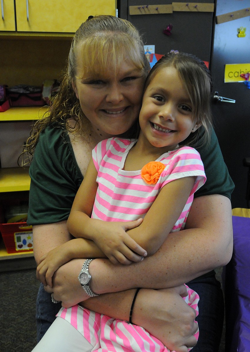 Five-year-old Abby Cubas couldnâ€™t wait to eat and sing with her mom Sonja Sotack.