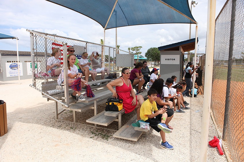 Parents and students sit in the stands and watch the baseball games, Friday, May 4, at Twin Lakes.