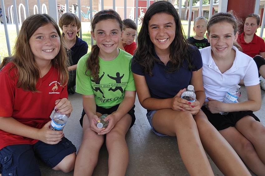Makenna Reynolds, Julia Gennocro, Lillian Heredia and Isabella Florio were eager to learn more about Southeastern Guide Dogs after they finished walking.