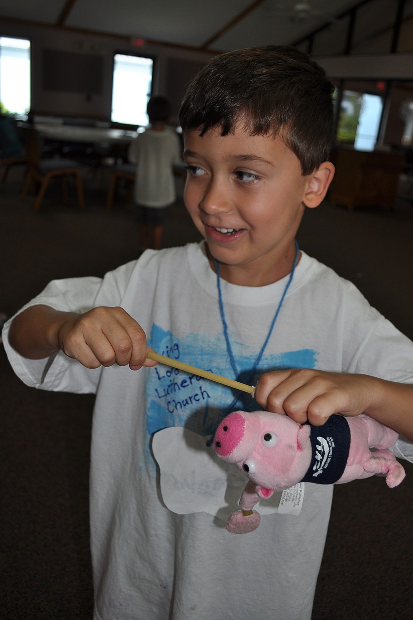 Nicholas Drizos, 5, was all smiles during game time.
