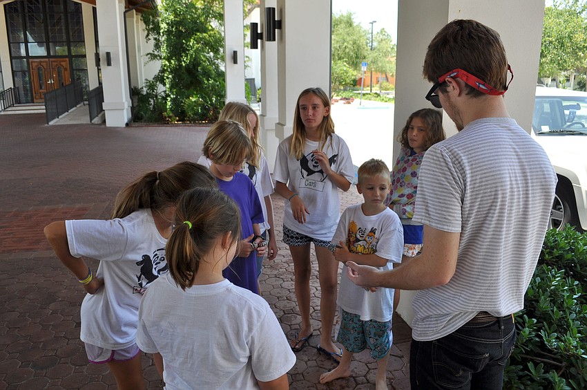 Camp counselors led the children in water fights and other games.
