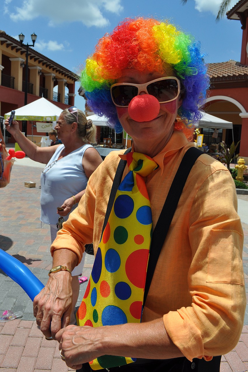 Second Ann Rose owner Barb Smith learned how to create balloon animals just for Kids Day.