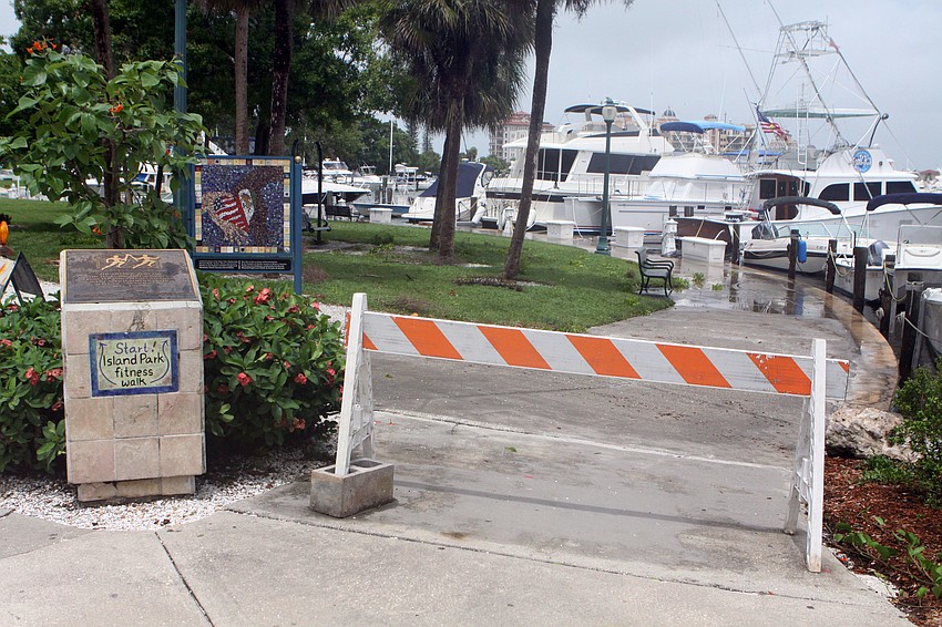 Park of Island Park's walking trail was blocked off due to flooding.