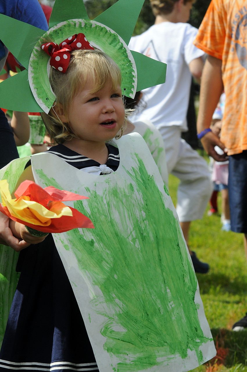 Two-year-old Ali Morgan and the rest of her classmates dressed up like the Statue of Liberty.