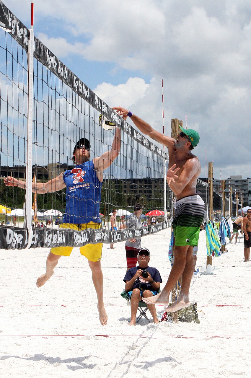 Bruno Lunardi tries to block Diogo Sousaâ€™s spike, Saturday, July 14.