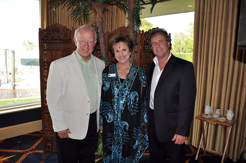 Karen Gallagher poses with Jay Goodley and Jim Spicer who provided the musical entertainment for the evening.