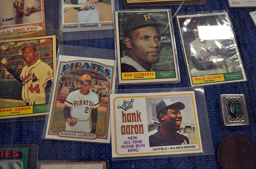 One booth included a collection of valuable vintage baseball cards, including Hank Aaron and Roberto Clemente cards.