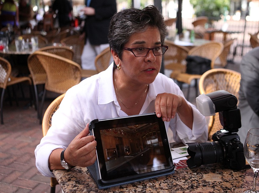 Maria Lyle uses her iPad to help pitch herself and her business.