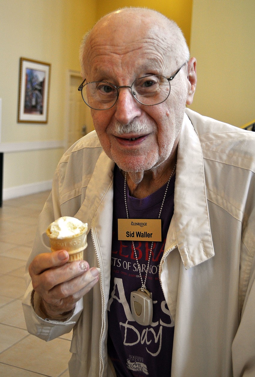 Sid Waller enjoys his cone of vanilla ice cream.
