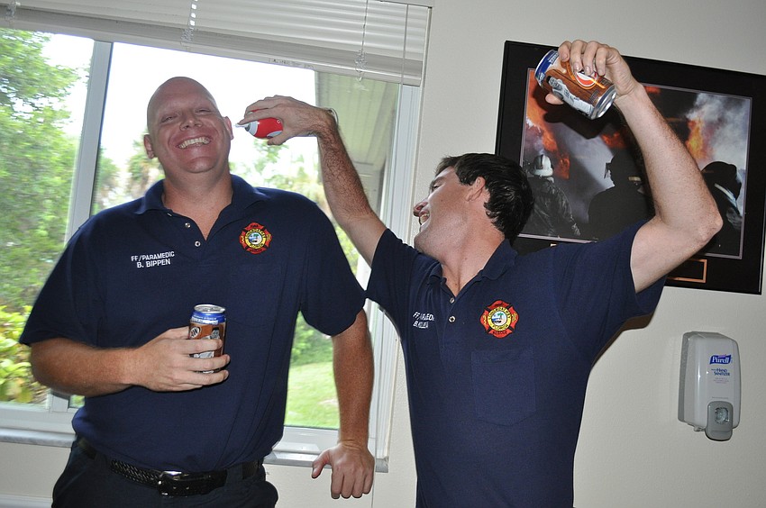 Firefighter Paramedic Bryan Bippen and Firefighter Paramedic Brian Kolesa