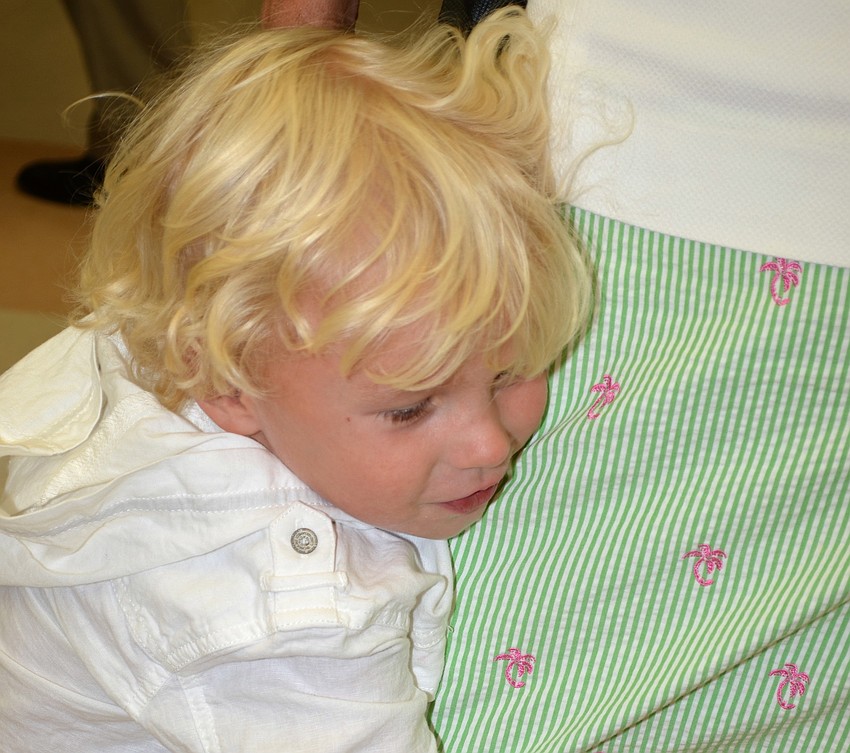 Oliver Jackson hugs his mom.