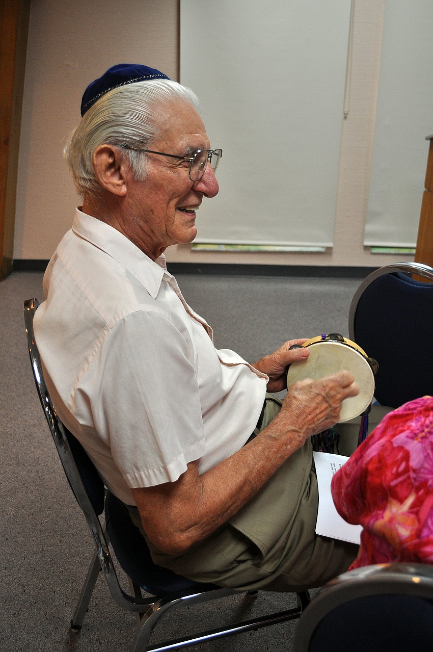 Abe Zeewy got into the spirit of the event by playing one of the many tambourines.