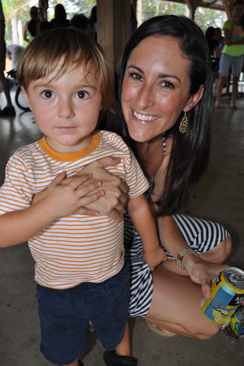 Ben Fairweather enjoys the picnic with his mom, Jessica.