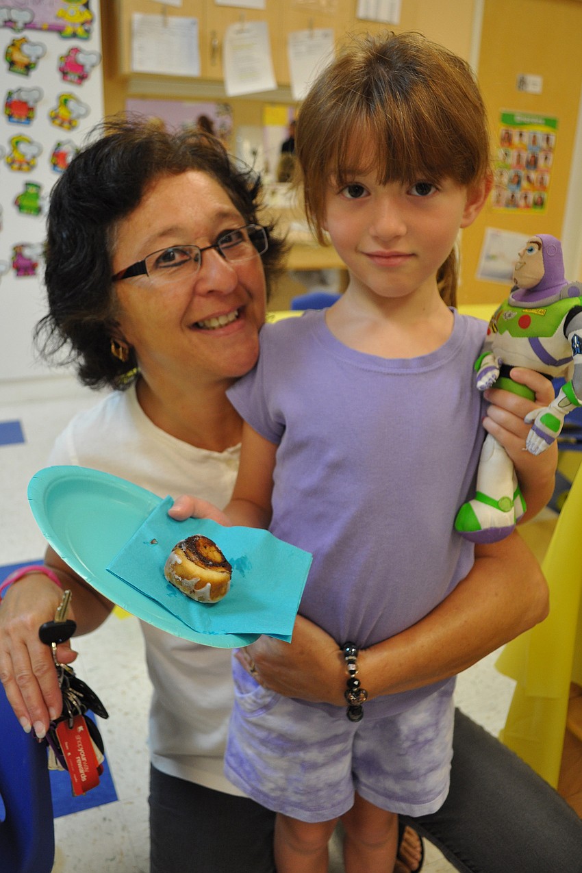 Louise Dube ate with her granddaughter, Madison Downes, 4.