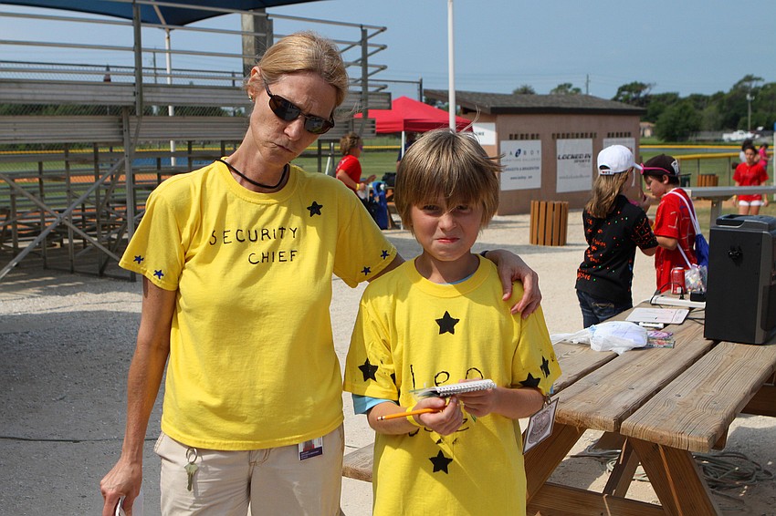 Carrie Ross and Leo Belz were part of the security team Friday, April 29 during the Ashton Elementary fifth grade World Series day at Twin Lakes.