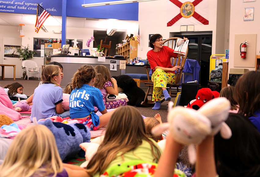 Sandy Waite read â€œEdward the Emuâ€, Thursday, April 26, during Phillippi Shoresâ€™ storybook and PJ night.