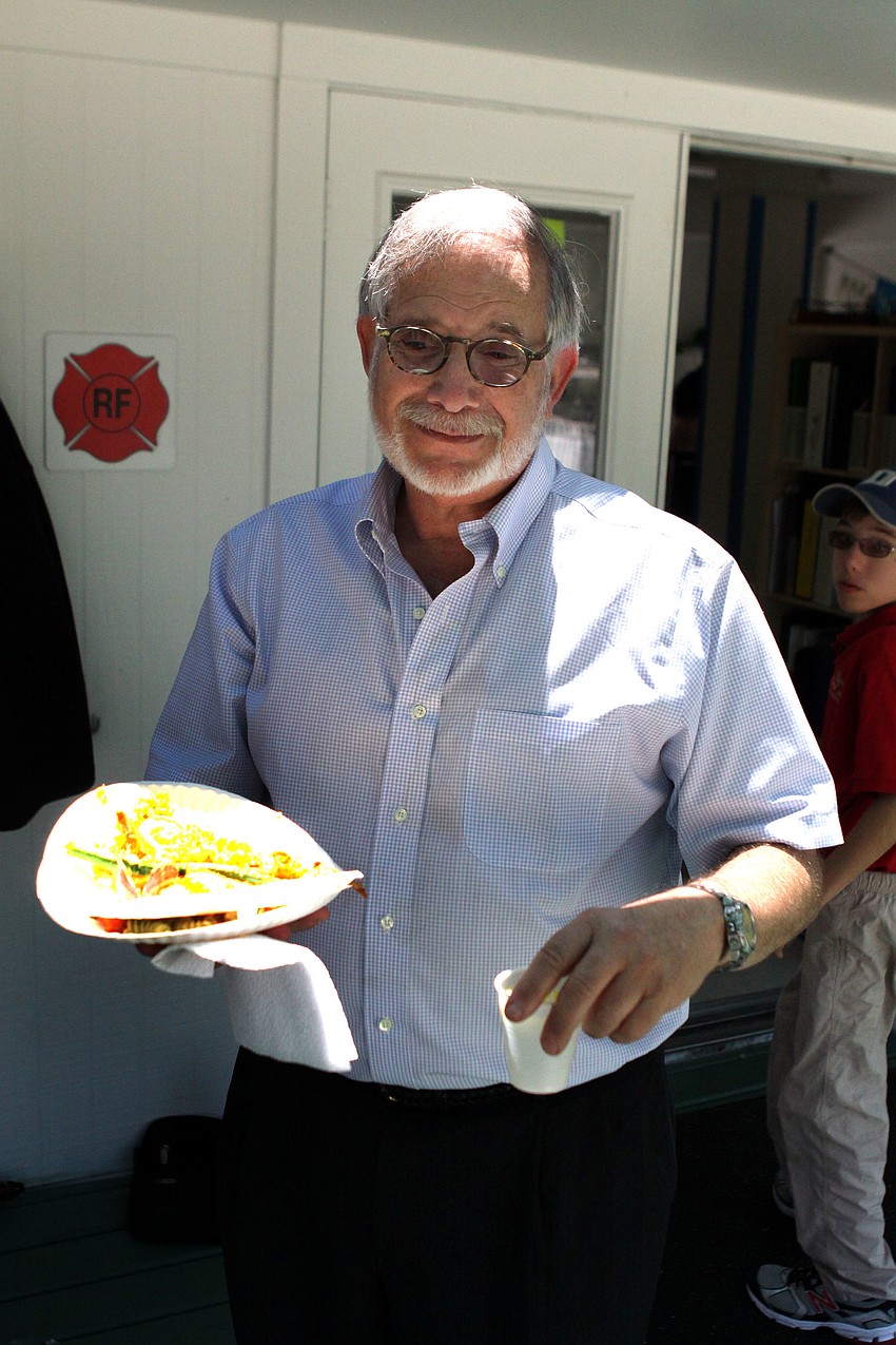 Headmaster Tim Seldin gets ready to enjoy some lunch with the students and faculty.