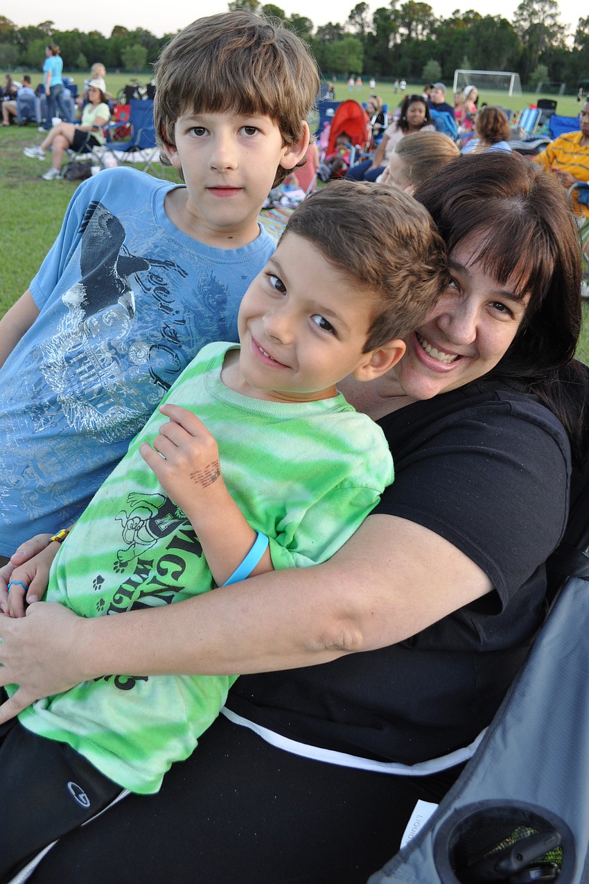 Zac and Max Piantanida, pictured with their mother, Mindy, attend McNeal Elementary School.