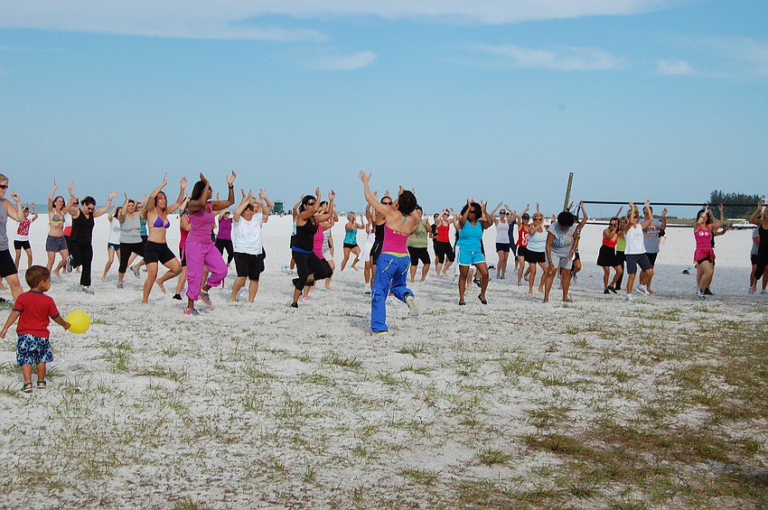 Zumba participants clap along to Vicki Sue Robinson's 