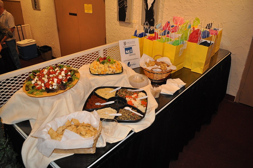 M&I Bank hosted the reception and the appetizers were provided by Hotel Indigo.