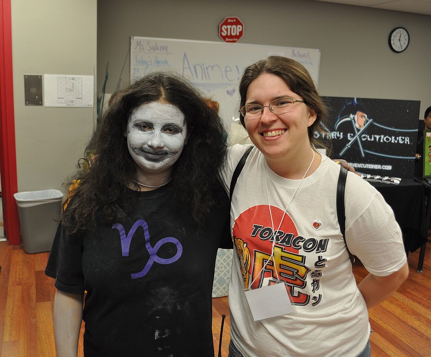 Victoria Garrett, president of the anime club poses with Liz Smith, the eventâ€™s organizer.