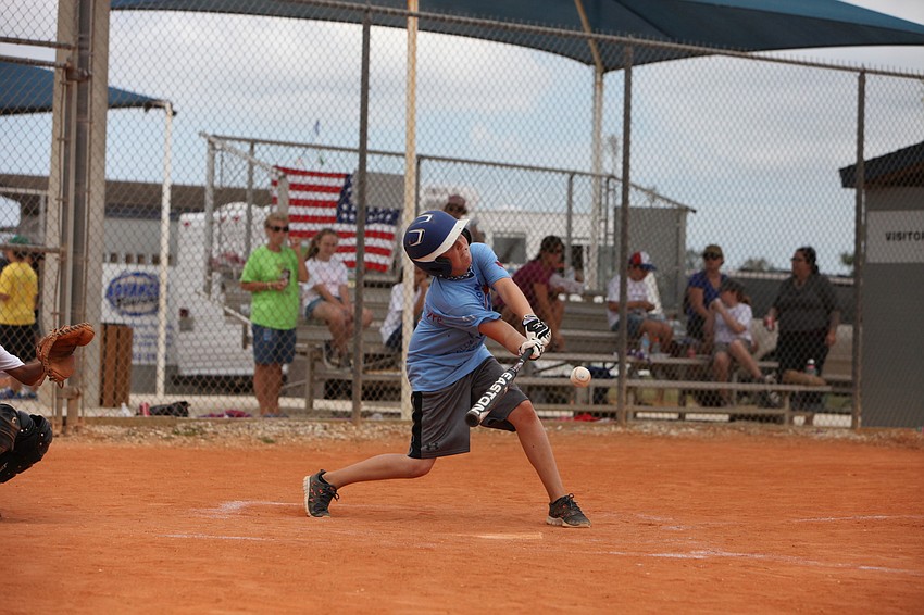 Austin Apap Bologna hits the ball.