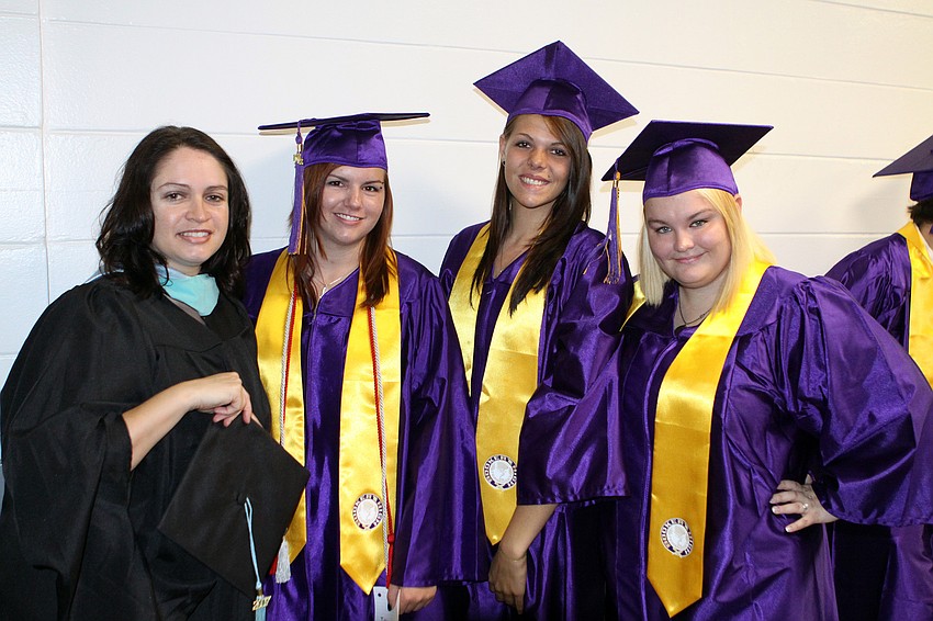 Daphne Lemaire poses with her graduating students Jillian Sadler, Jaime Wilson and Caitlin Shanaberger
