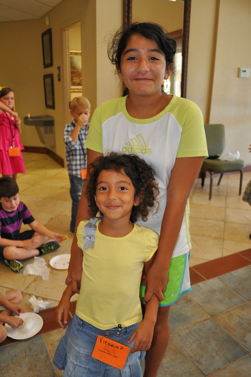Melanie Portal, 12, made sure to visit with her little sister, 5-year-old Victoria.