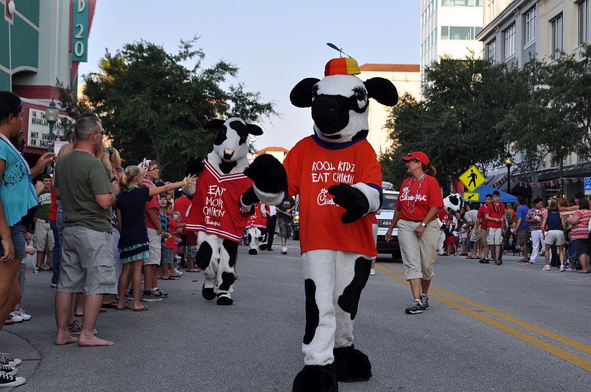 Chik-Fil-A cows greet onlookers.