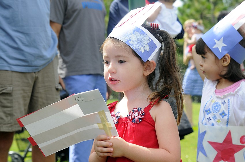 Three-year-old Ally Stavola sang along to the music.