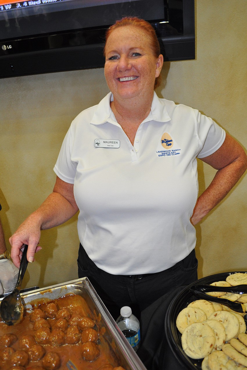 Maureen Bradley dished out meatballs and other appetizers for The Broken Egg restaurant.