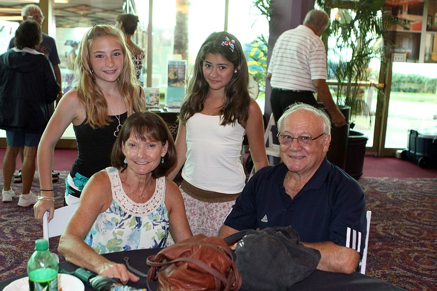 Maddie Martino, 12, and Ashley Wyble, 12, with Bebe and David Wyble