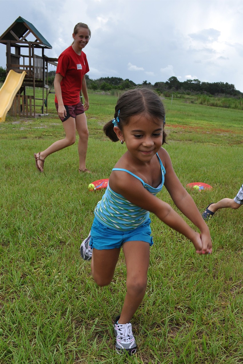 Lizbeth Cintron, 6, pretended to be an elephant during part of the obstacle course relay.